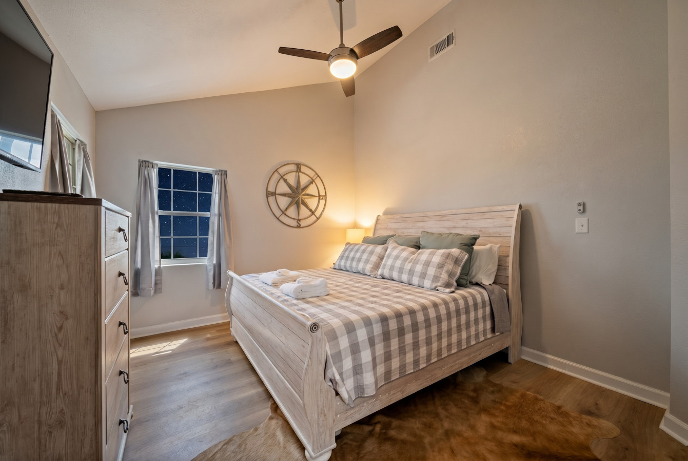 Relax & recharge in this inviting bedroom