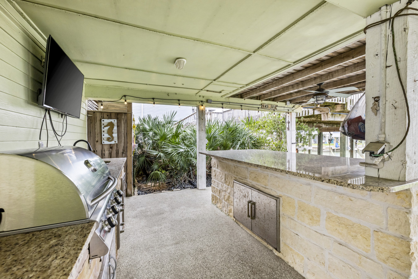 Grill up a feast in this fully equipped outdoor kitchen