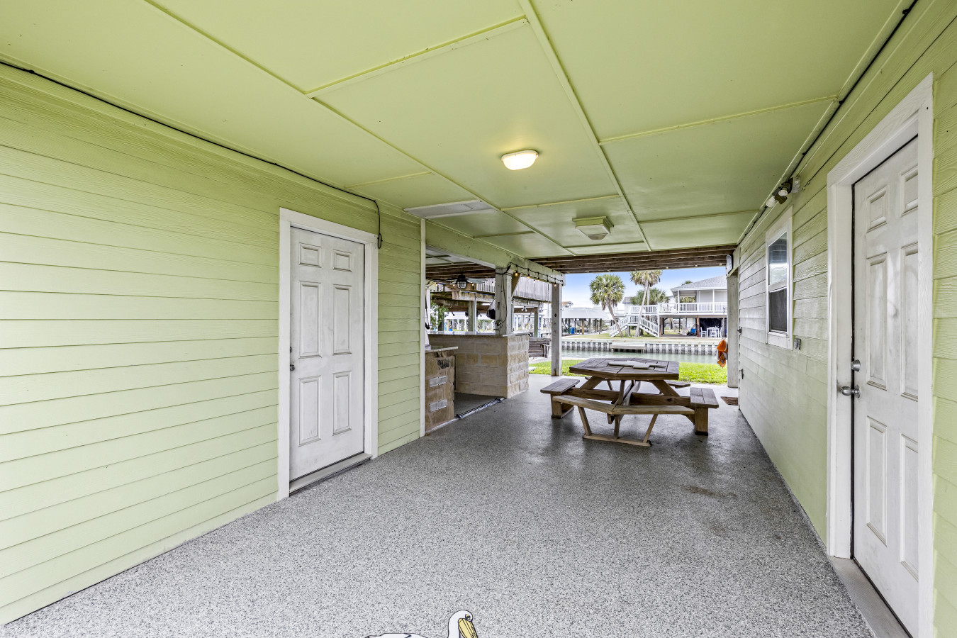 Escape the sun and relax in this shaded outdoor space