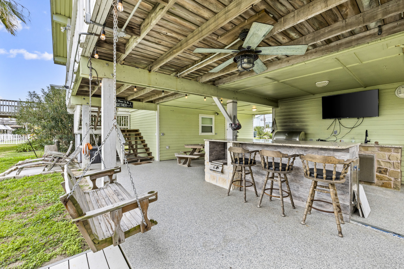Gather and unwind in this fun, covered outdoor hangout