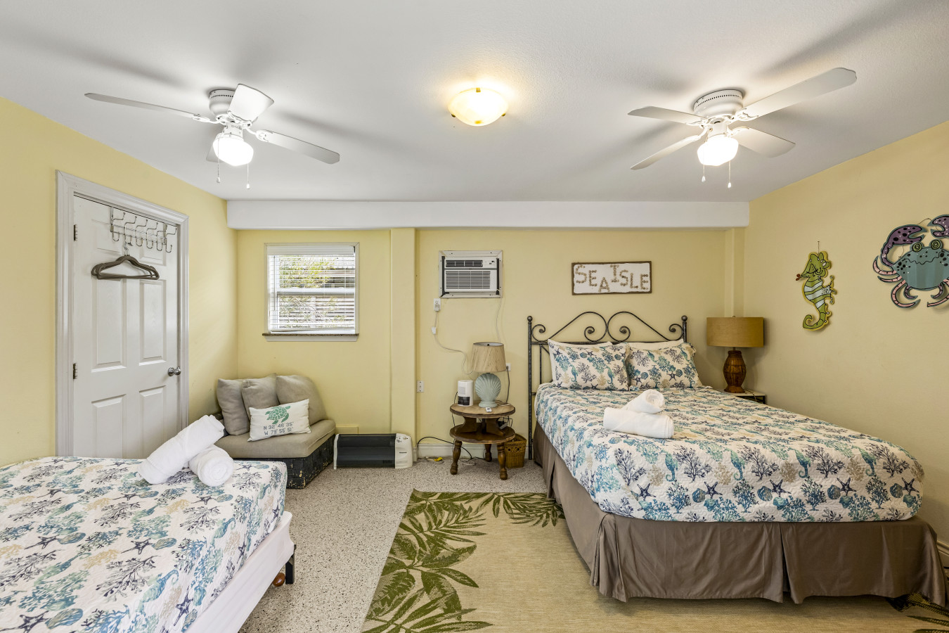 This bedroom has 2 queen beds