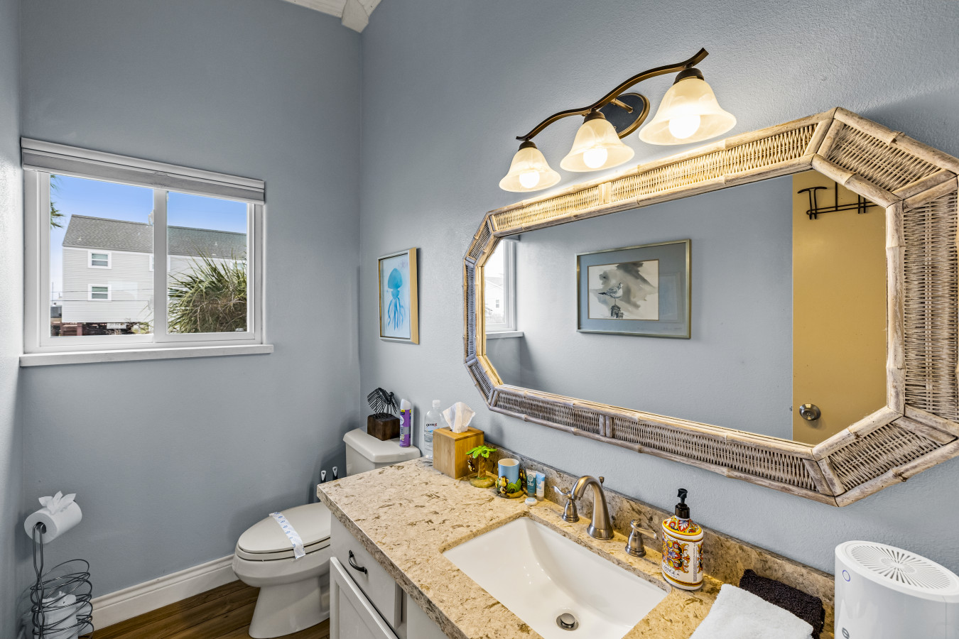 Refresh and rejuvenate in this bright, coastal bathroom shared by other bedrooms