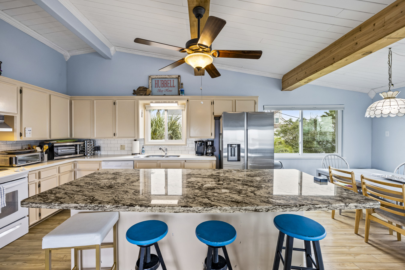 A bright kitchen designed for easy meal prep and gathering