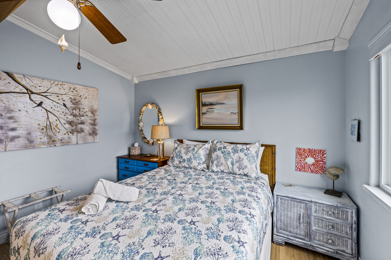This bedroom has a queen-sized bed