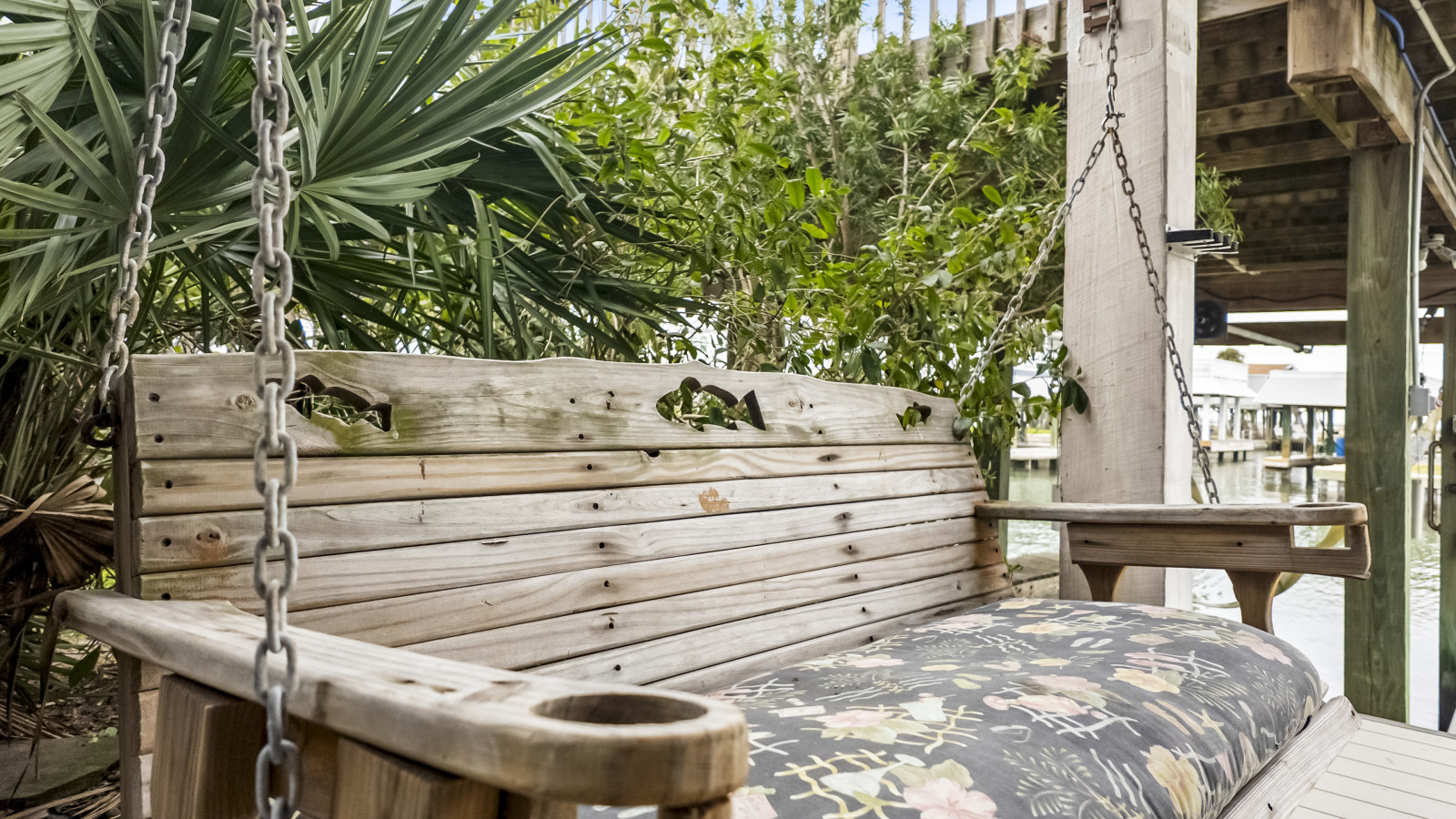 Swing, relax, and enjoy the peaceful waterfront setting