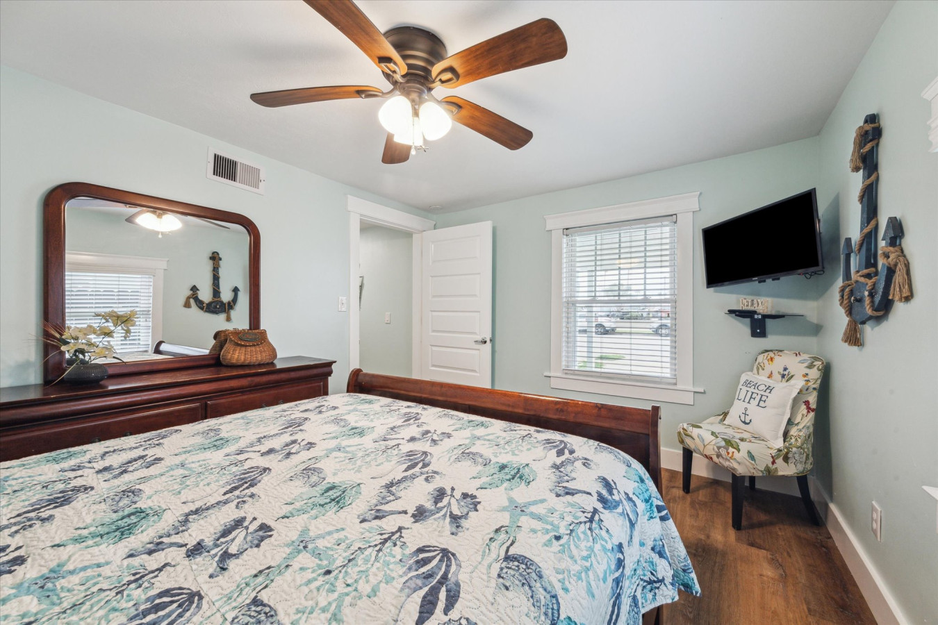 Relax in this cozy queen bedroom