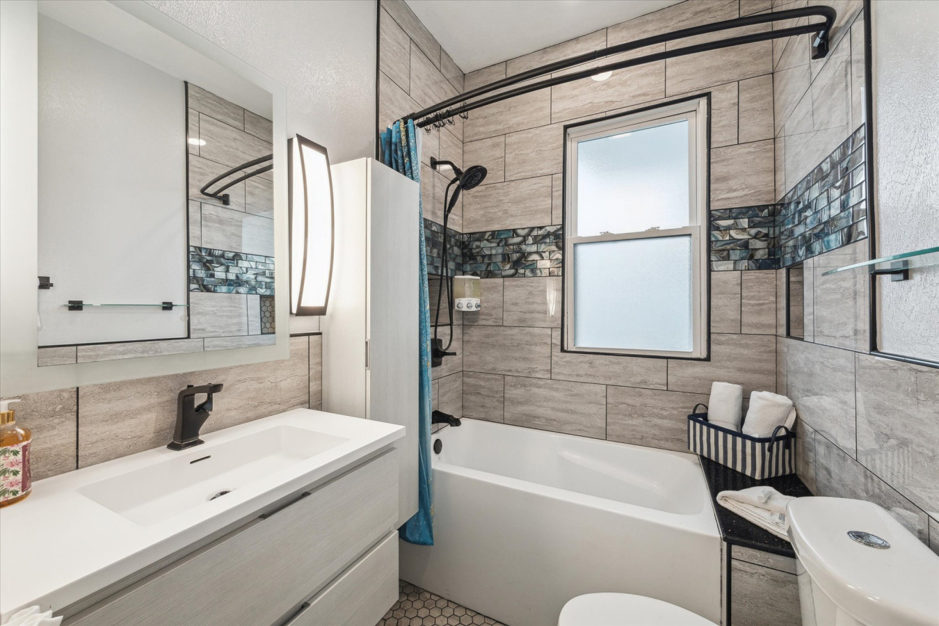 Enjoy the convenience of a large vanity with ample drawer storage for your essentials