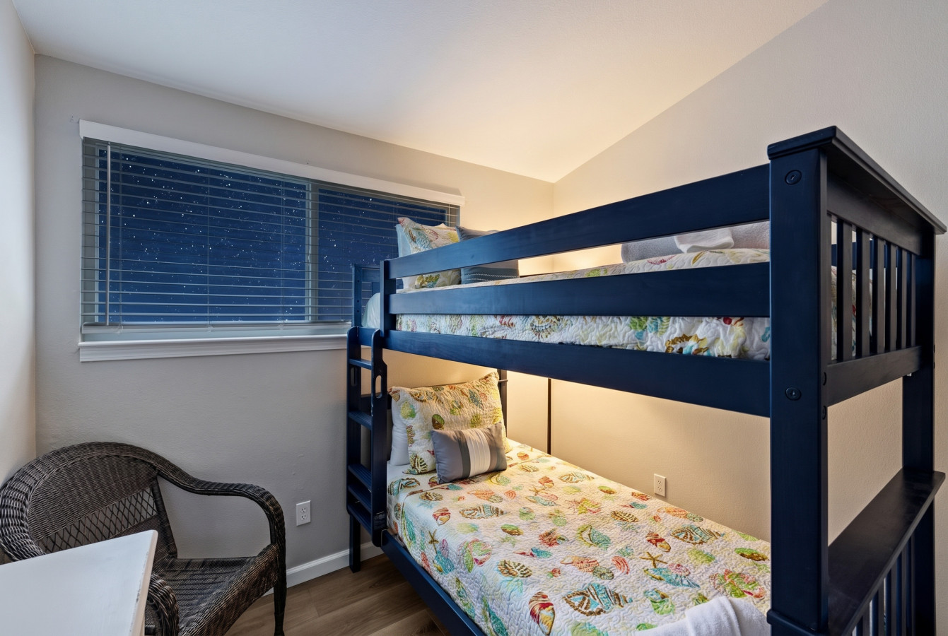 This bedroom has a twin over twin bunk bed