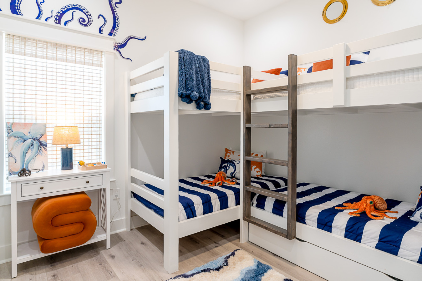 This bedroom has two twin/twin bunk beds with a trundle