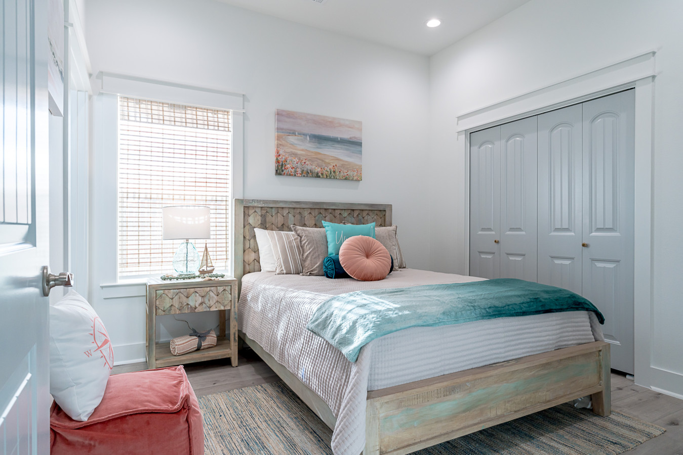 This bedroom has a queen-sized bed