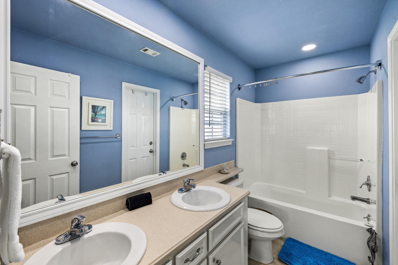 Refresh and rejuvenate in this bright bathroom