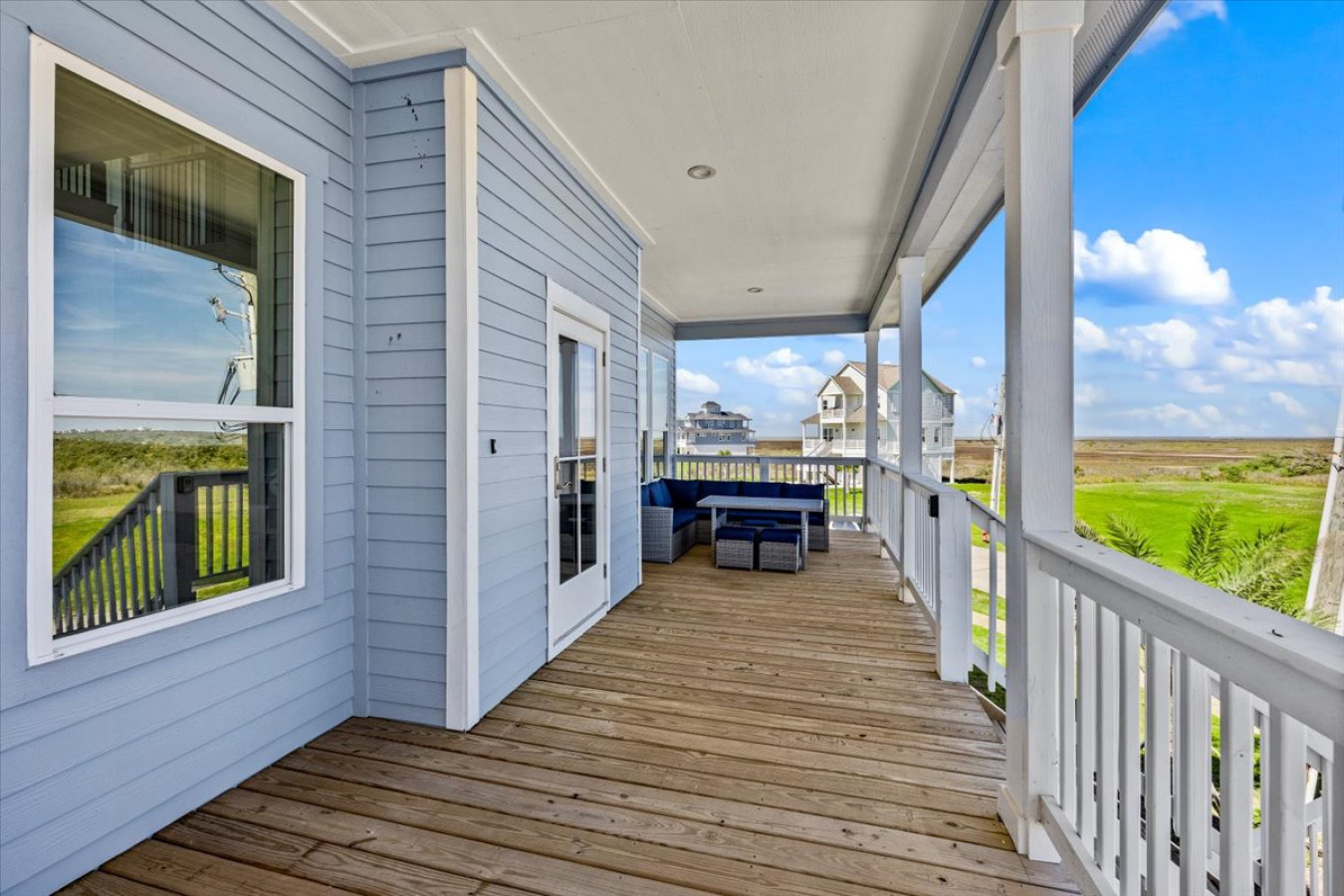 Enjoy fresh coastal air from your private porch