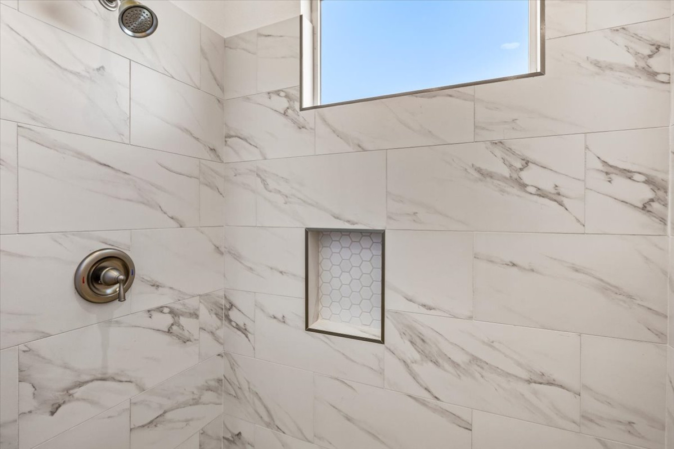 Light-filled bathroom with modern finishes