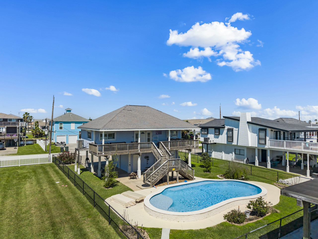 Enjoy sunny days by the pool and peaceful evenings on the deck