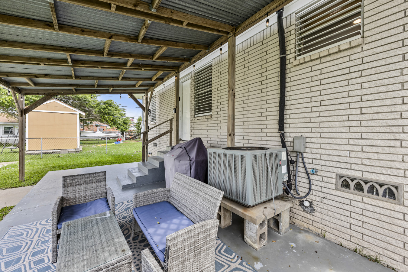 Kick back and unwind in this laid-back patio setting