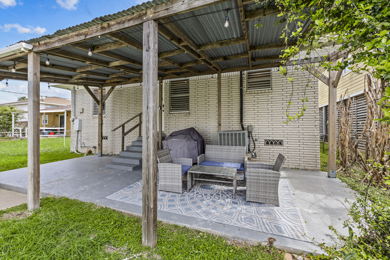 Another angle of the backyard patio area