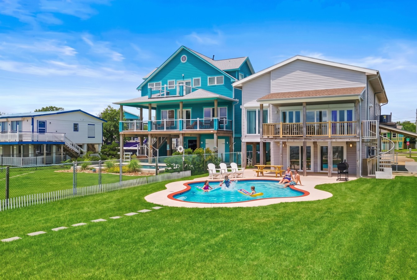 Family fun in the sun by the pool