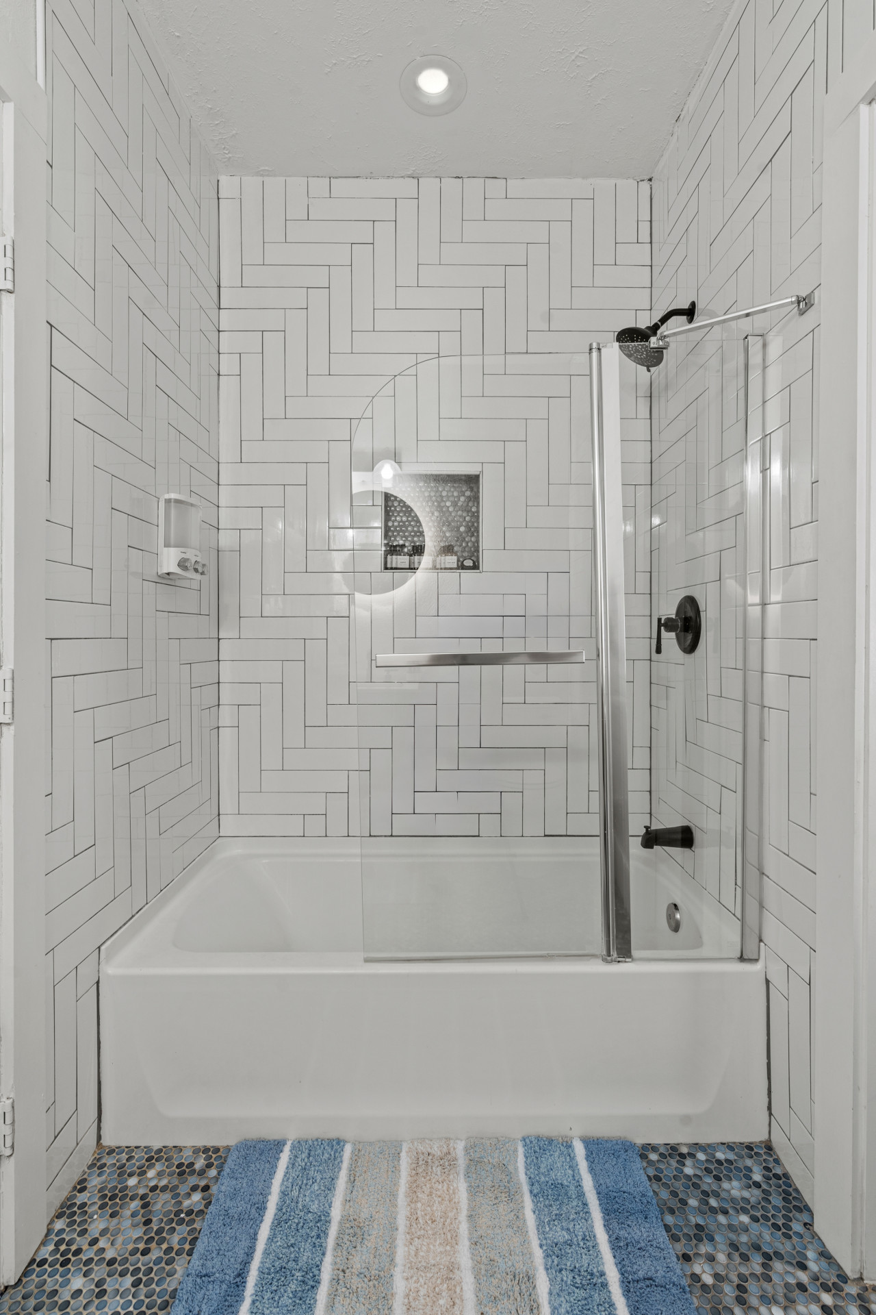This bathroom offers a place to relax after a long day