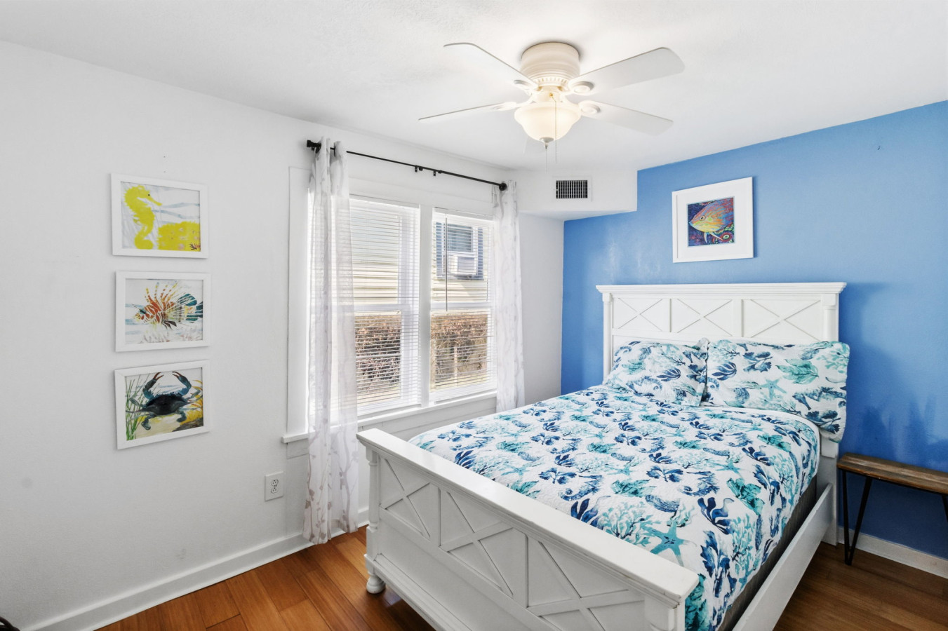 This bedroom has a queen-sized bed