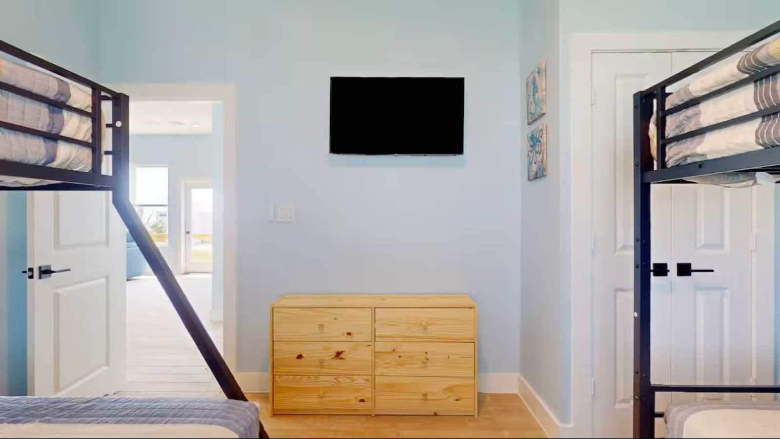 Light-filled bedroom with simple, functional design