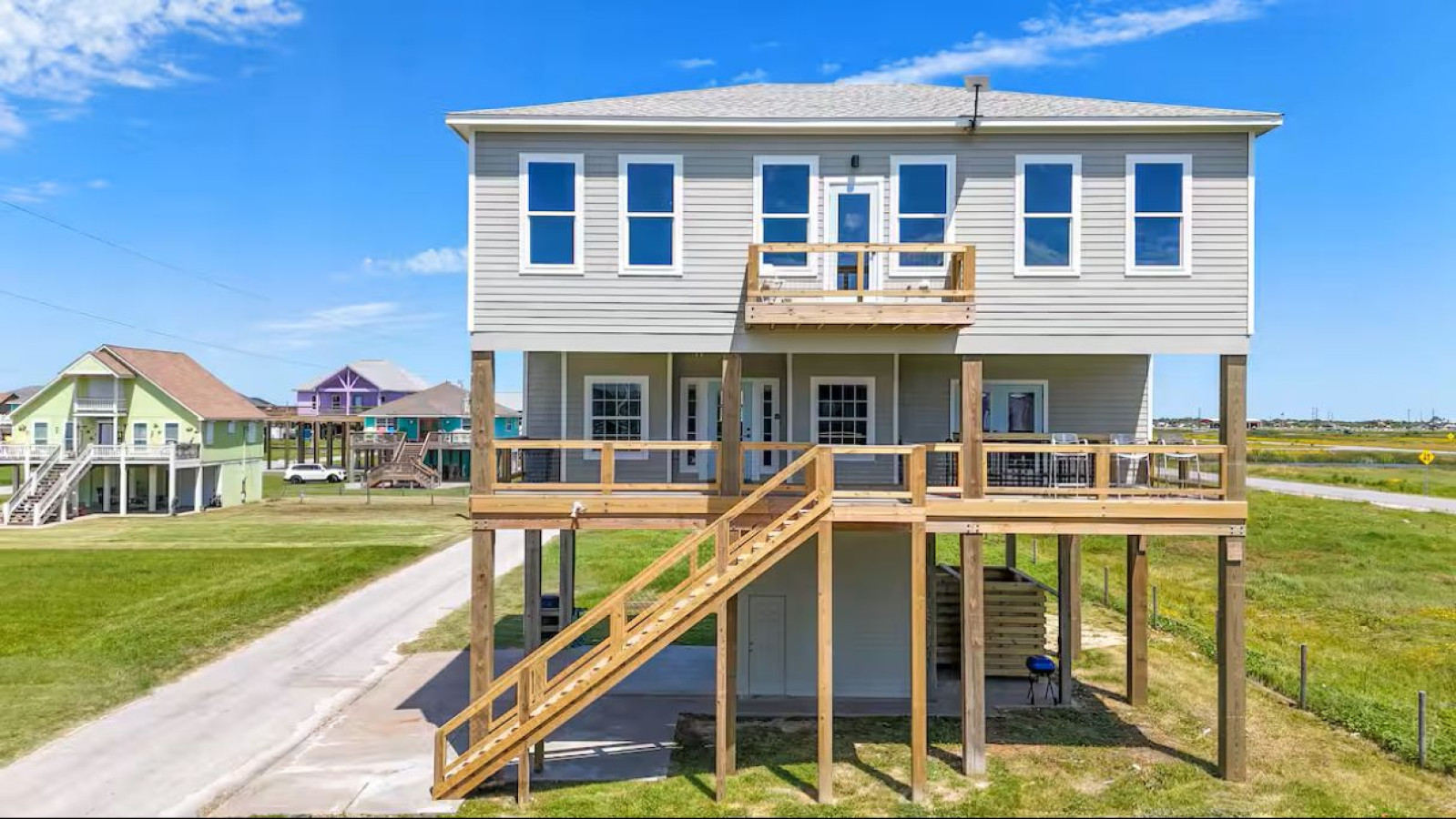 Bright, airy beach house with large wraparound deck