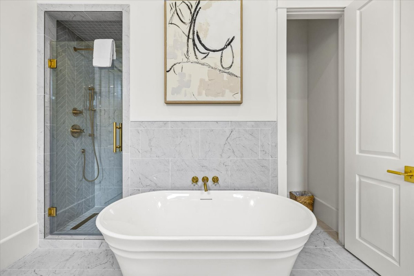 Unwind in style in this elegant primary bath