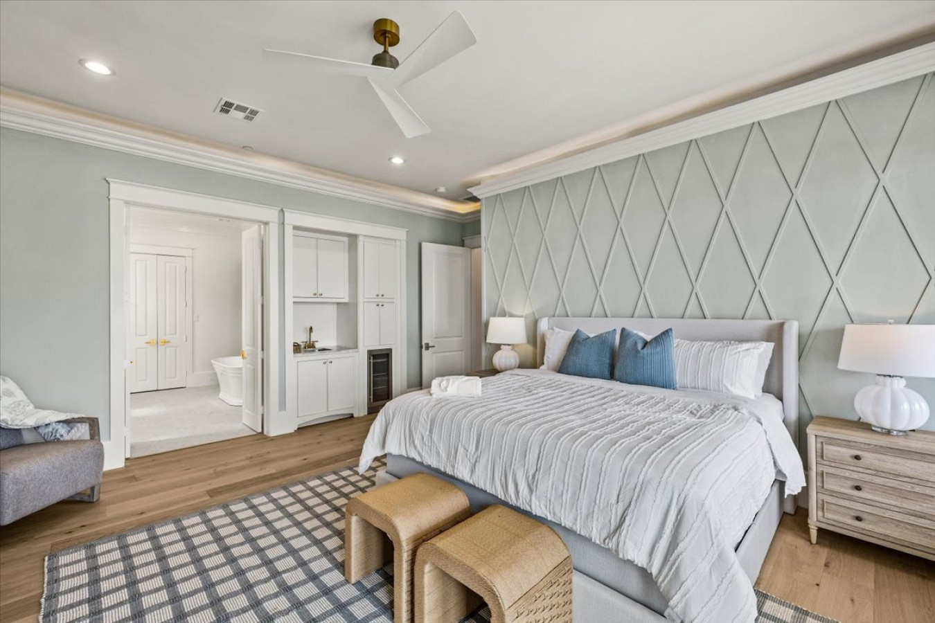 This bedroom has a king sized bed and an ensuite bathroom