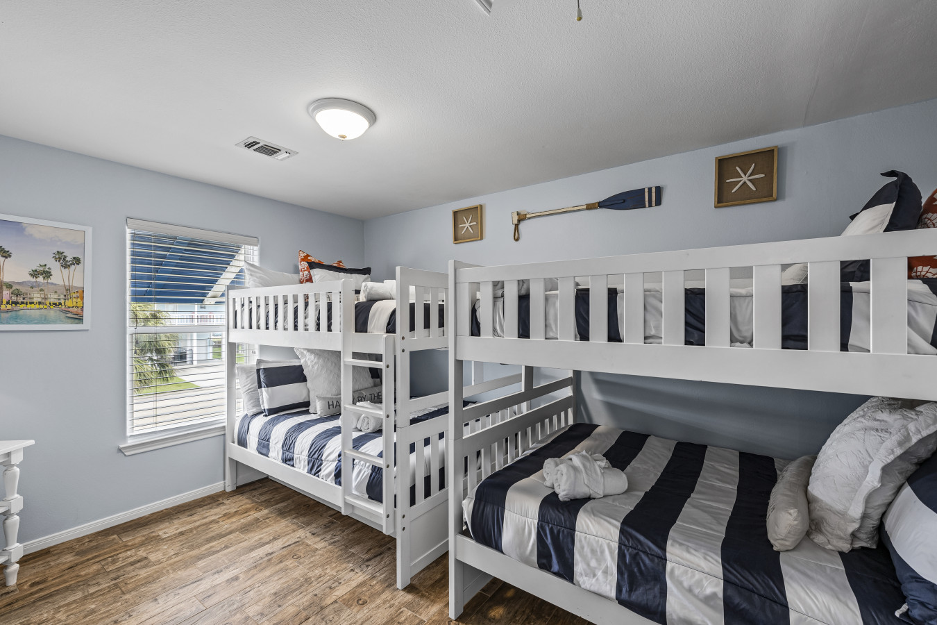 This bedroom has two full over full bunk beds