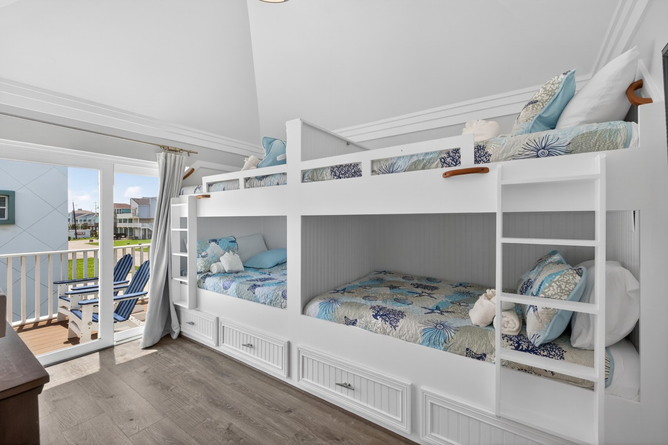 This bedroom has 2 built in full over full bunk beds