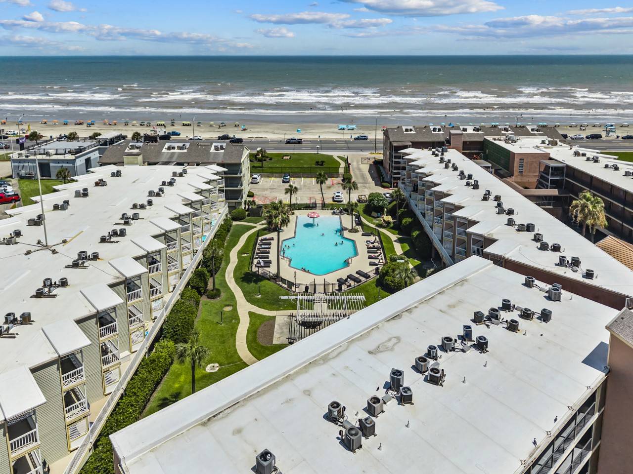 Relax poolside & soak up the Galveston sunshine