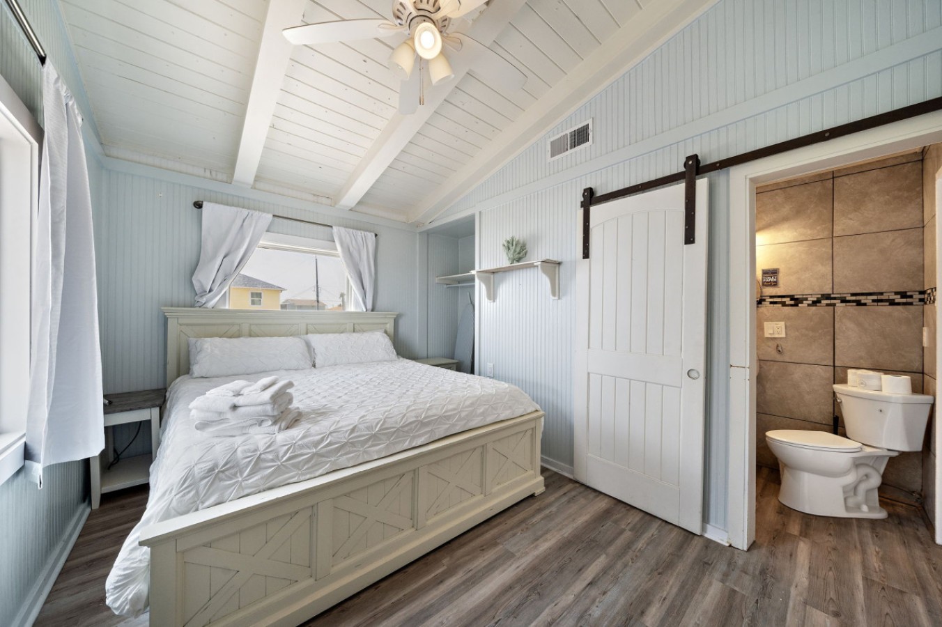 A relaxing retreat awaits in this comfy bedroom