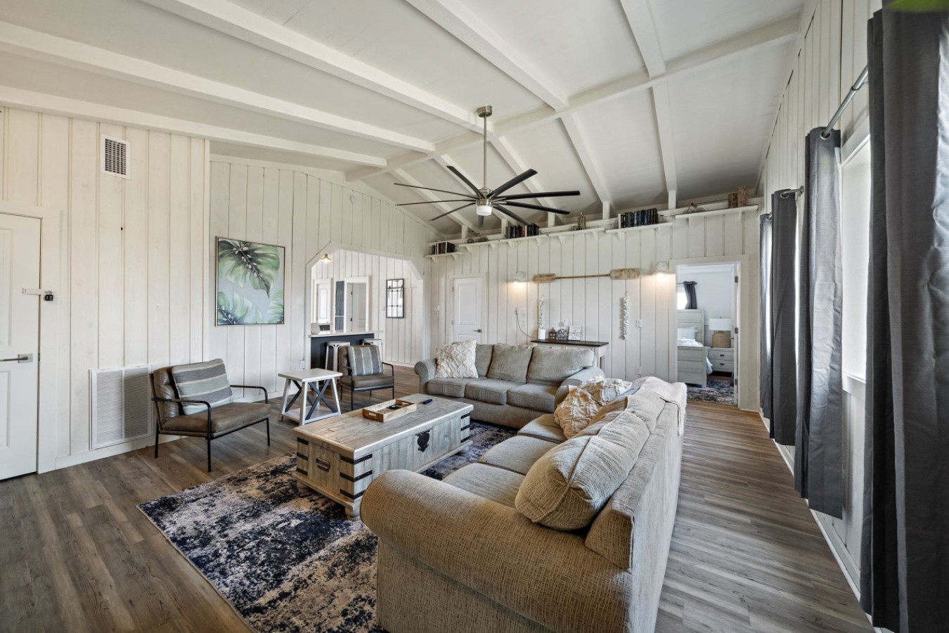 Curl up with a good book in the inviting living room