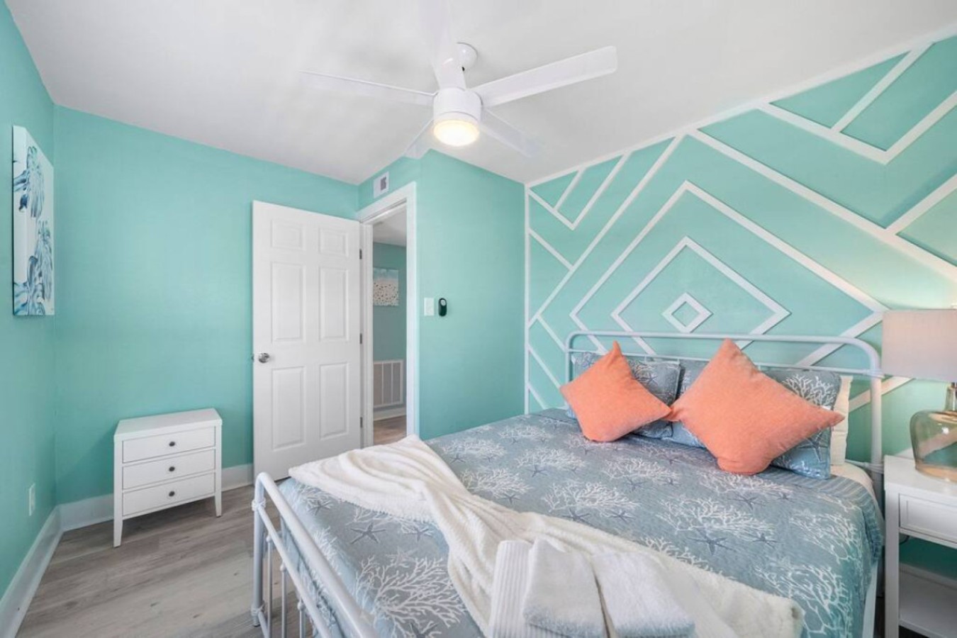 This bedroom has a queen-sized bed