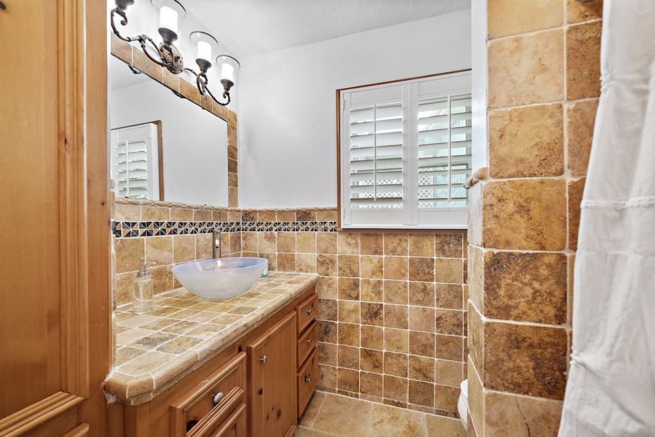 This bathroom is shared by several bedrooms