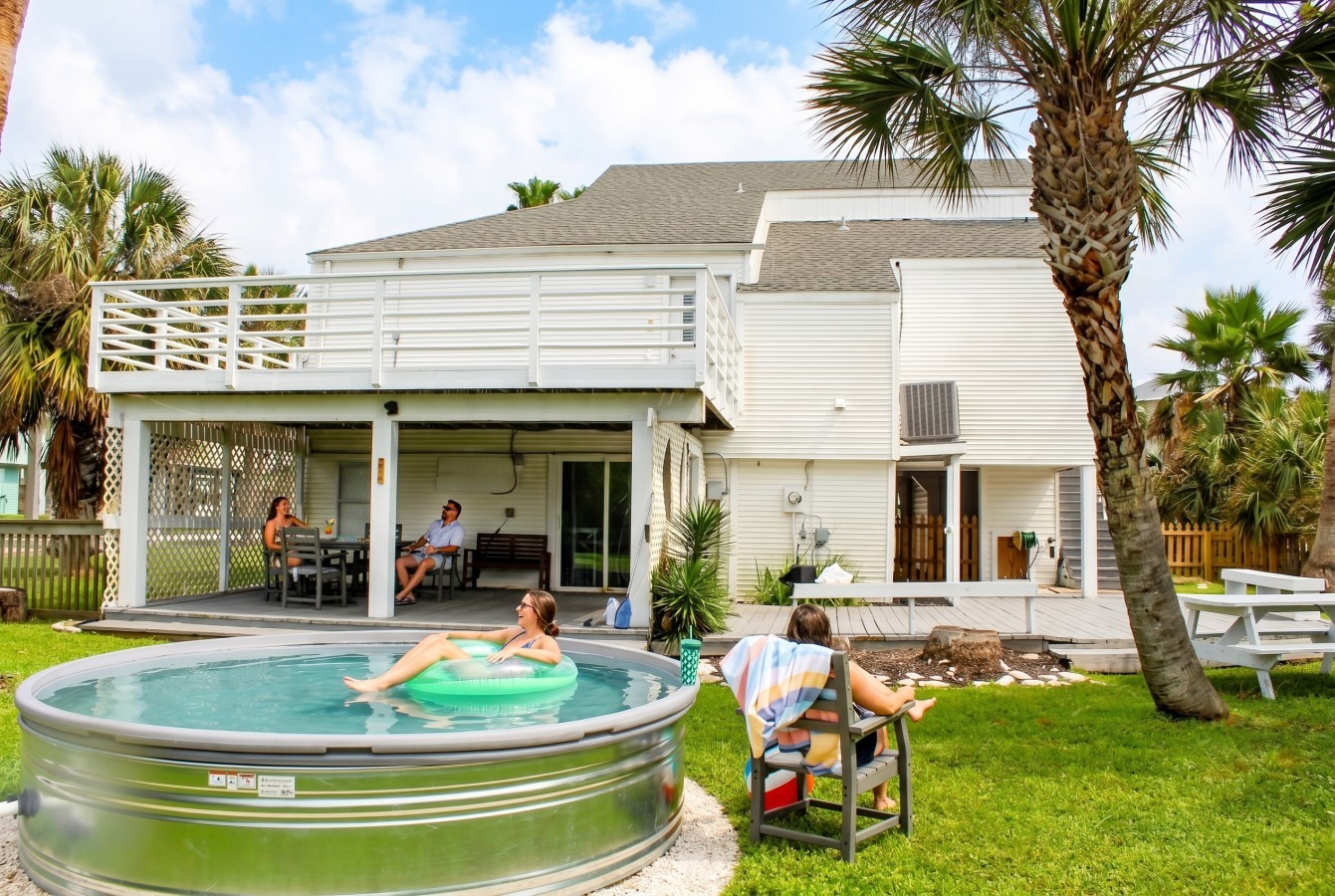 Family fun in the sun by the pool