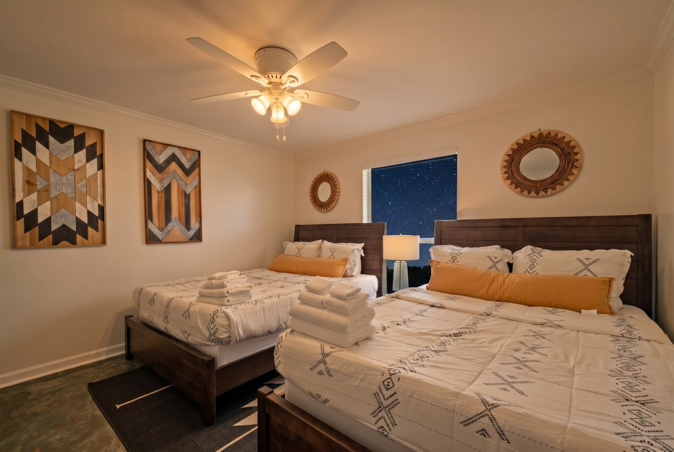 This bedroom has 2 Queen beds
