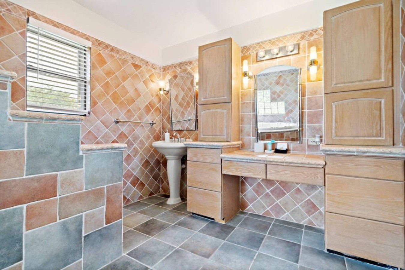 This bathroom is connected to a single bedroom