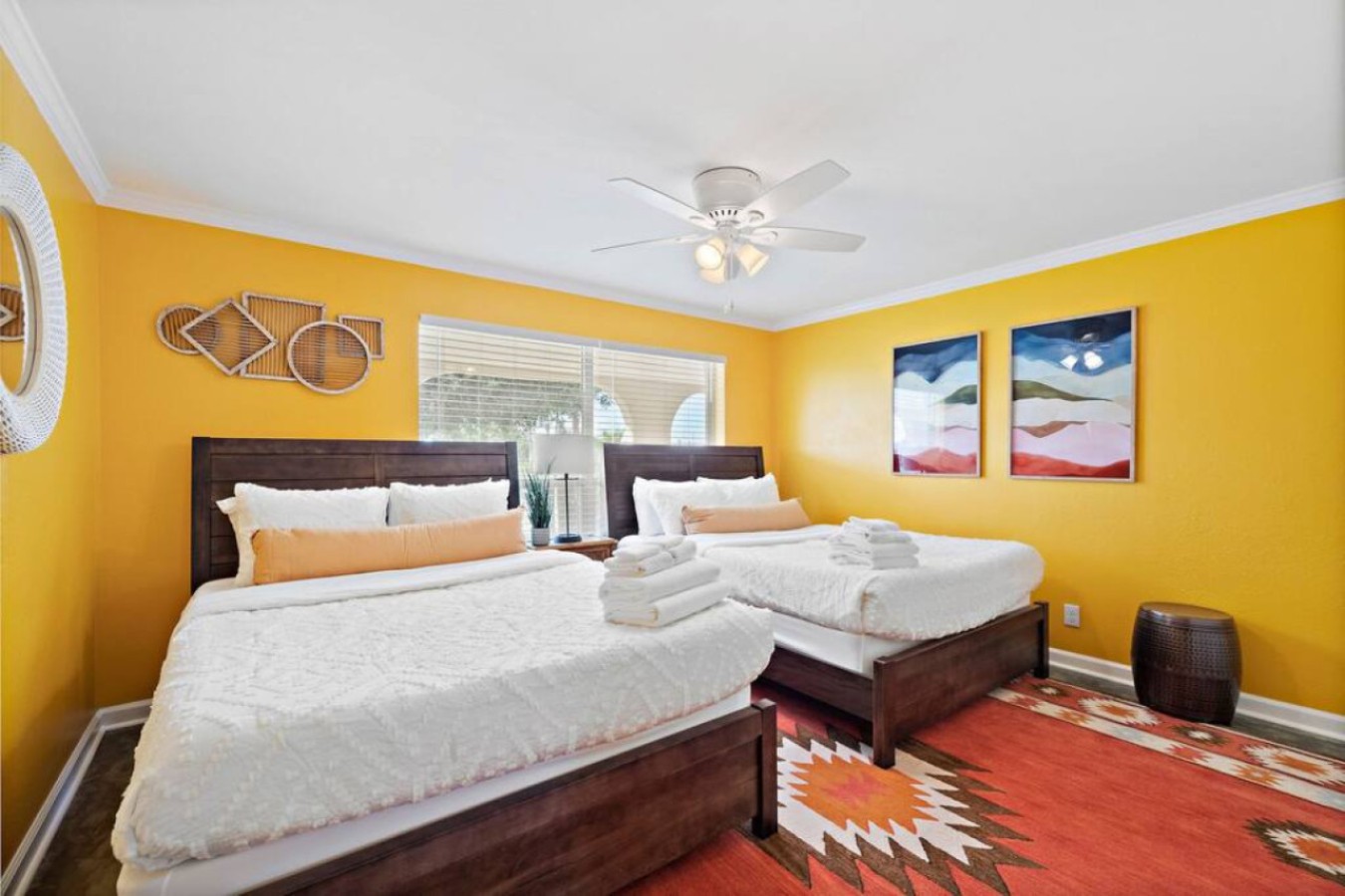 This bedroom has 2 Queen beds