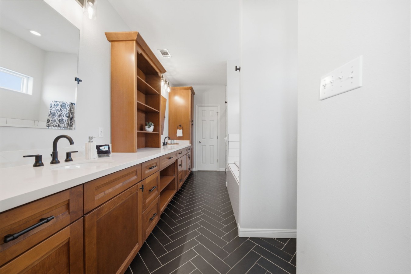 This bathroom offers a place to relax after a long day
