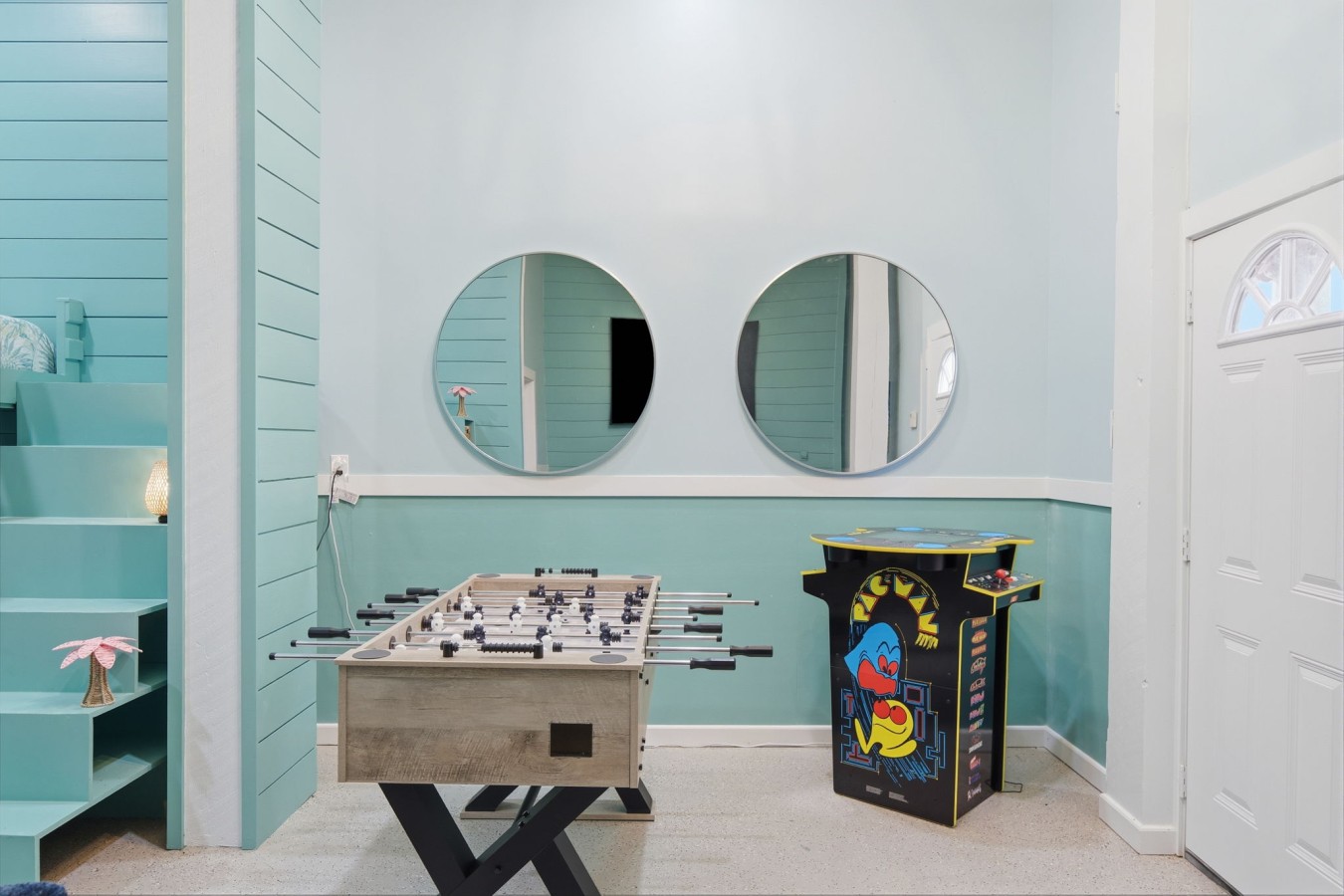 Enjoy this game room with a variety of games