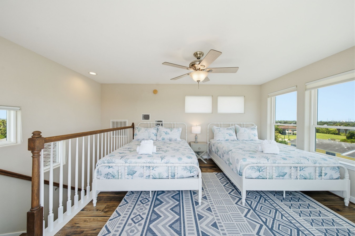 This bedroom has 2 queen-sized beds