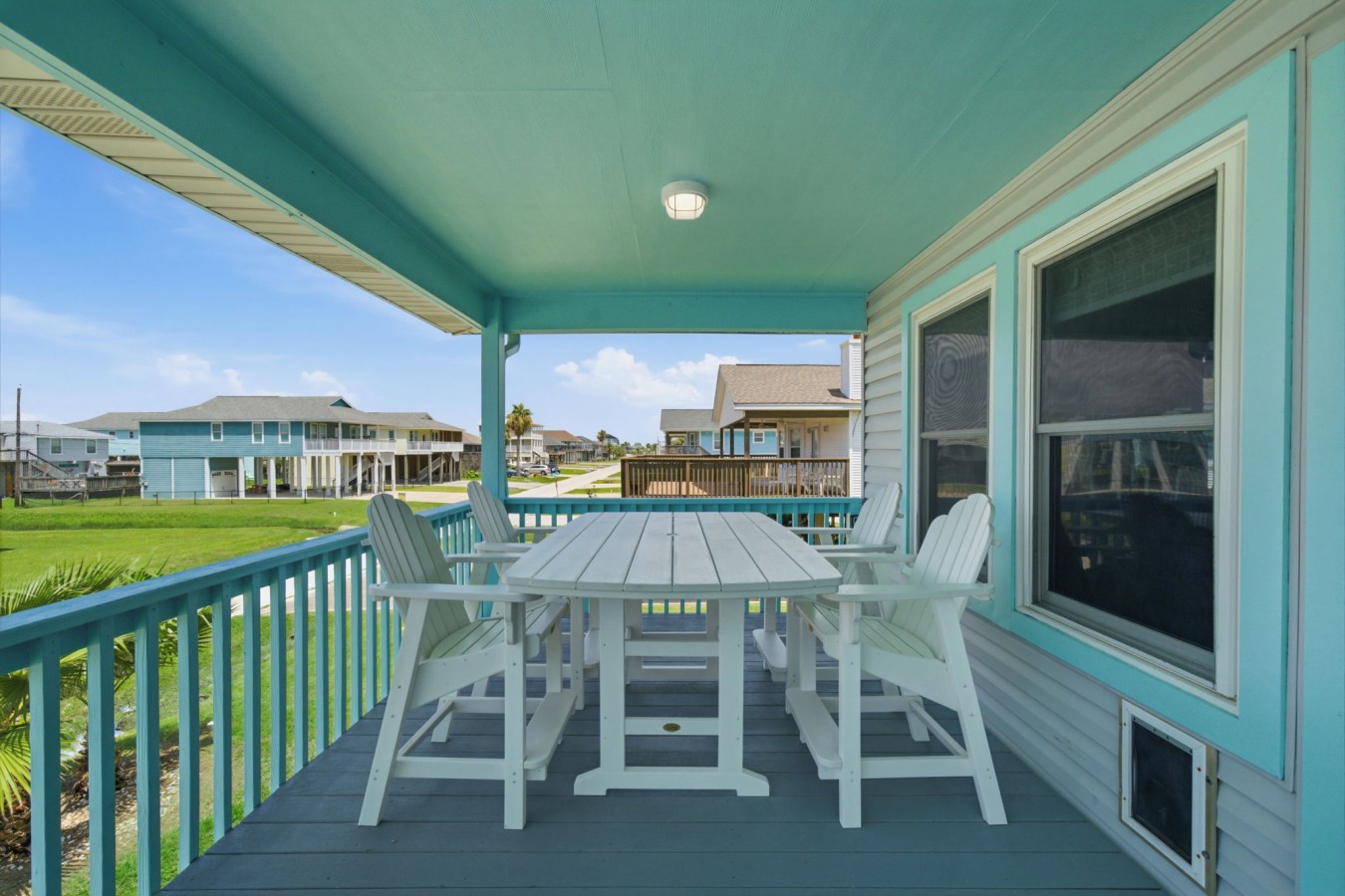 Unwind and dine al fresco on this sunny porch