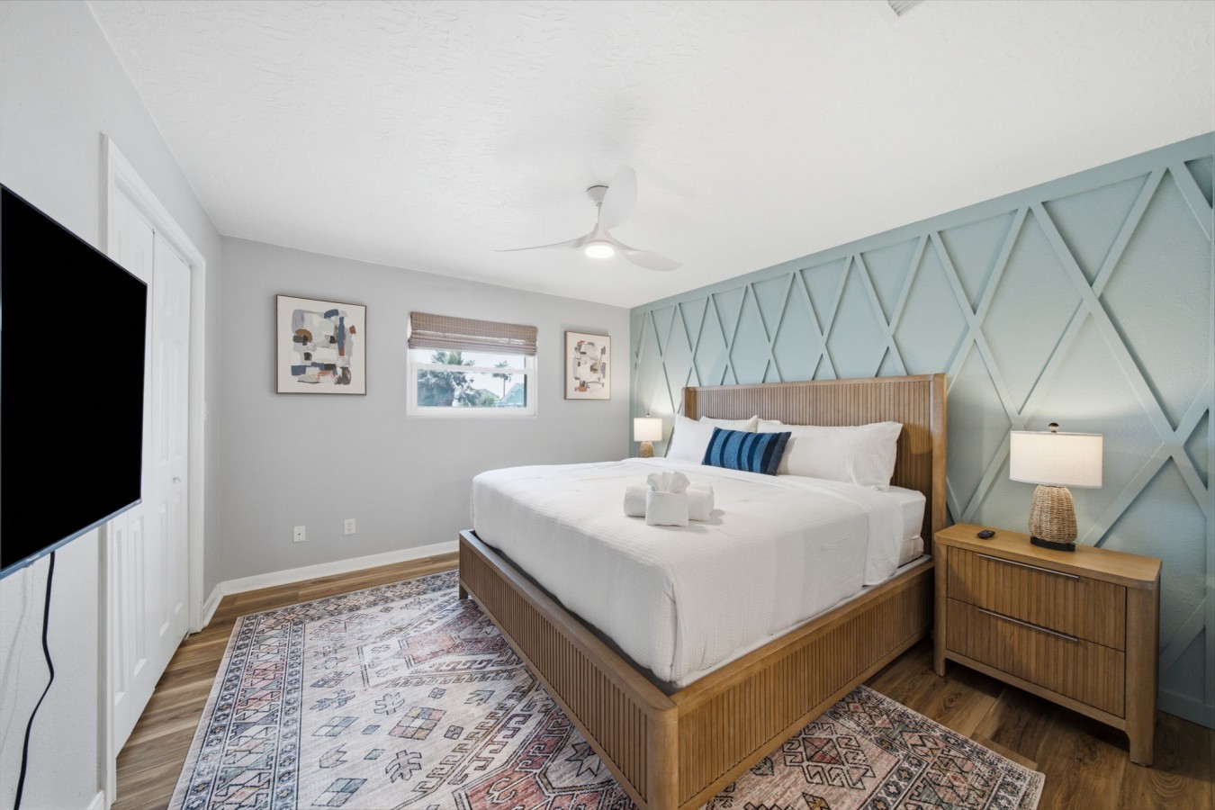 This bedroom has a king-sized bed & a private en-suite bathroom