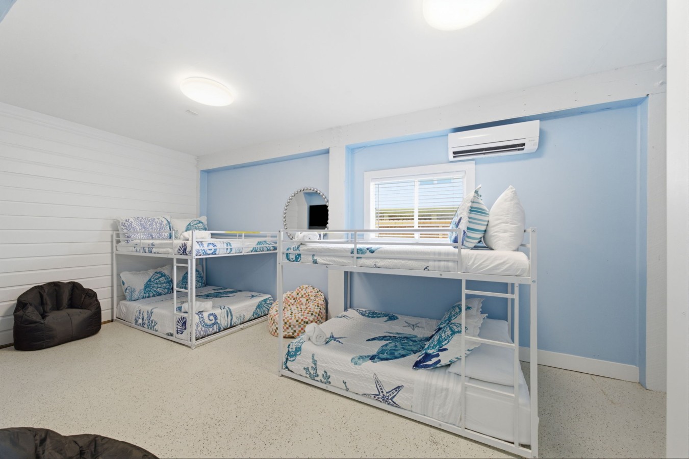 This bedroom has two full-over-full bunk beds