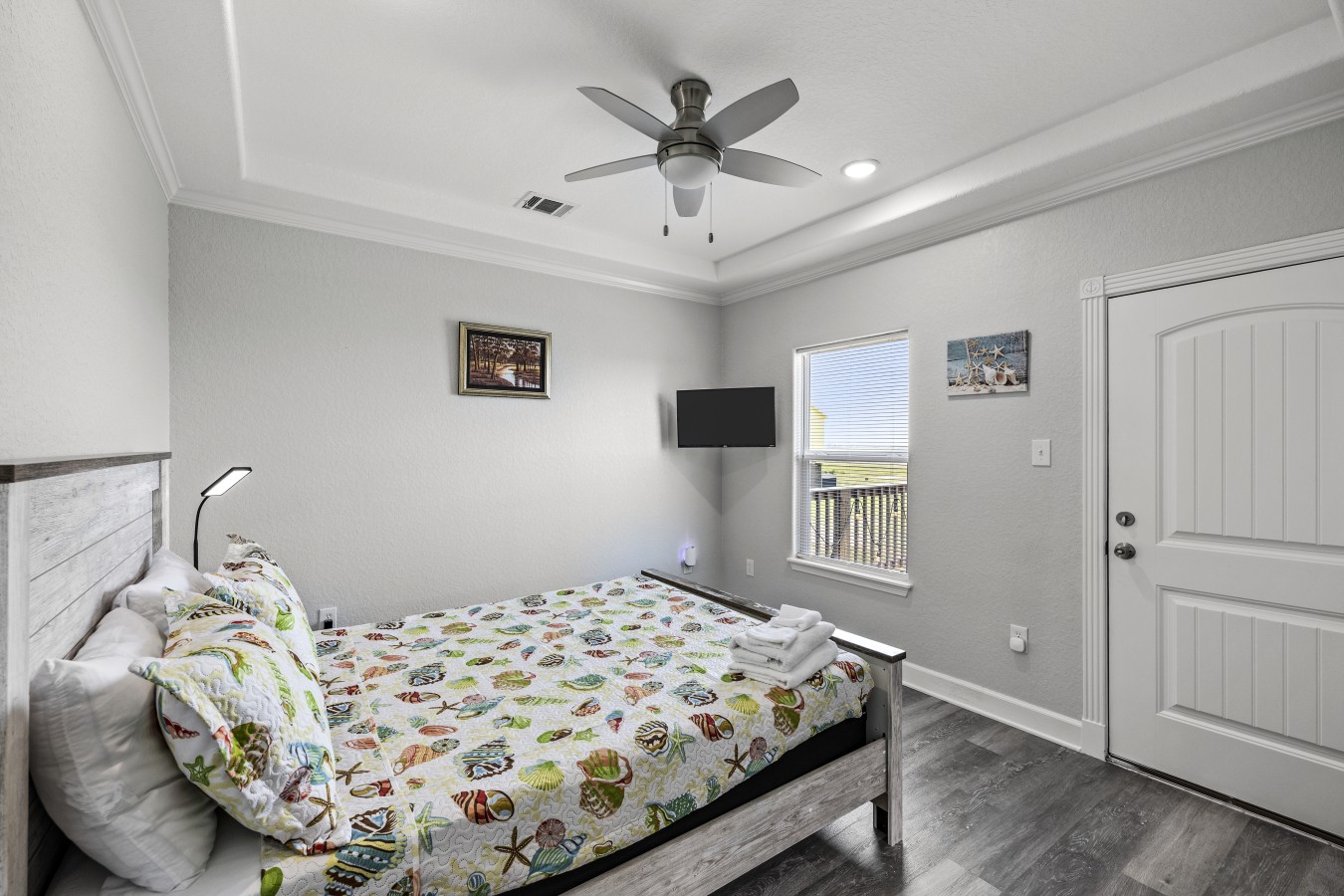 This bedroom has a queen-sized bed