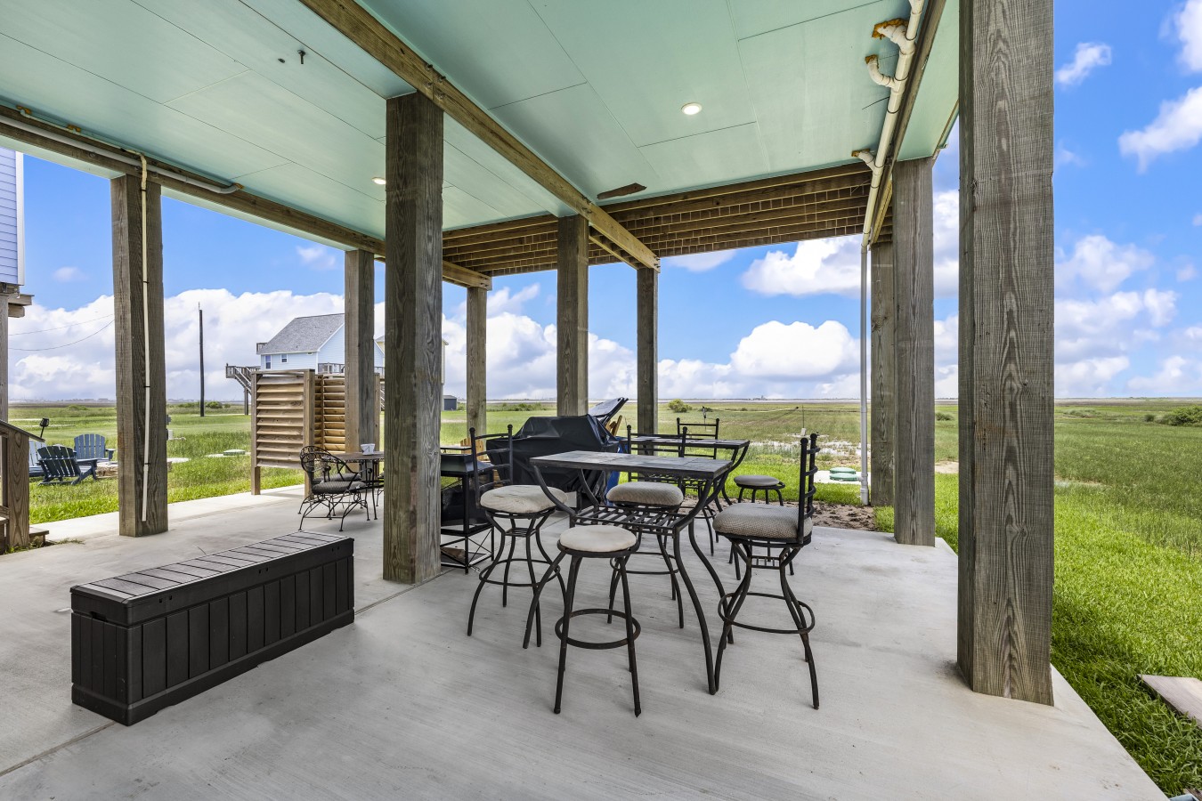 Grill up a feast & gather under the covered patio