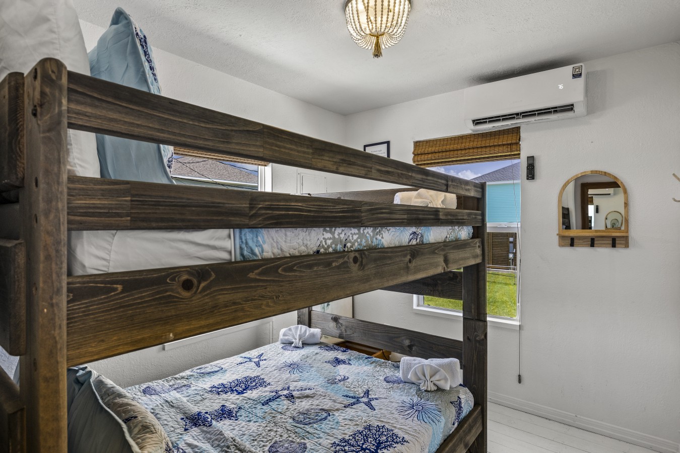 This bedroom has a full over full bunk bed