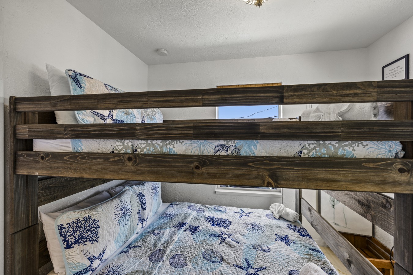 The kids will love calling this cozy bunk room their own