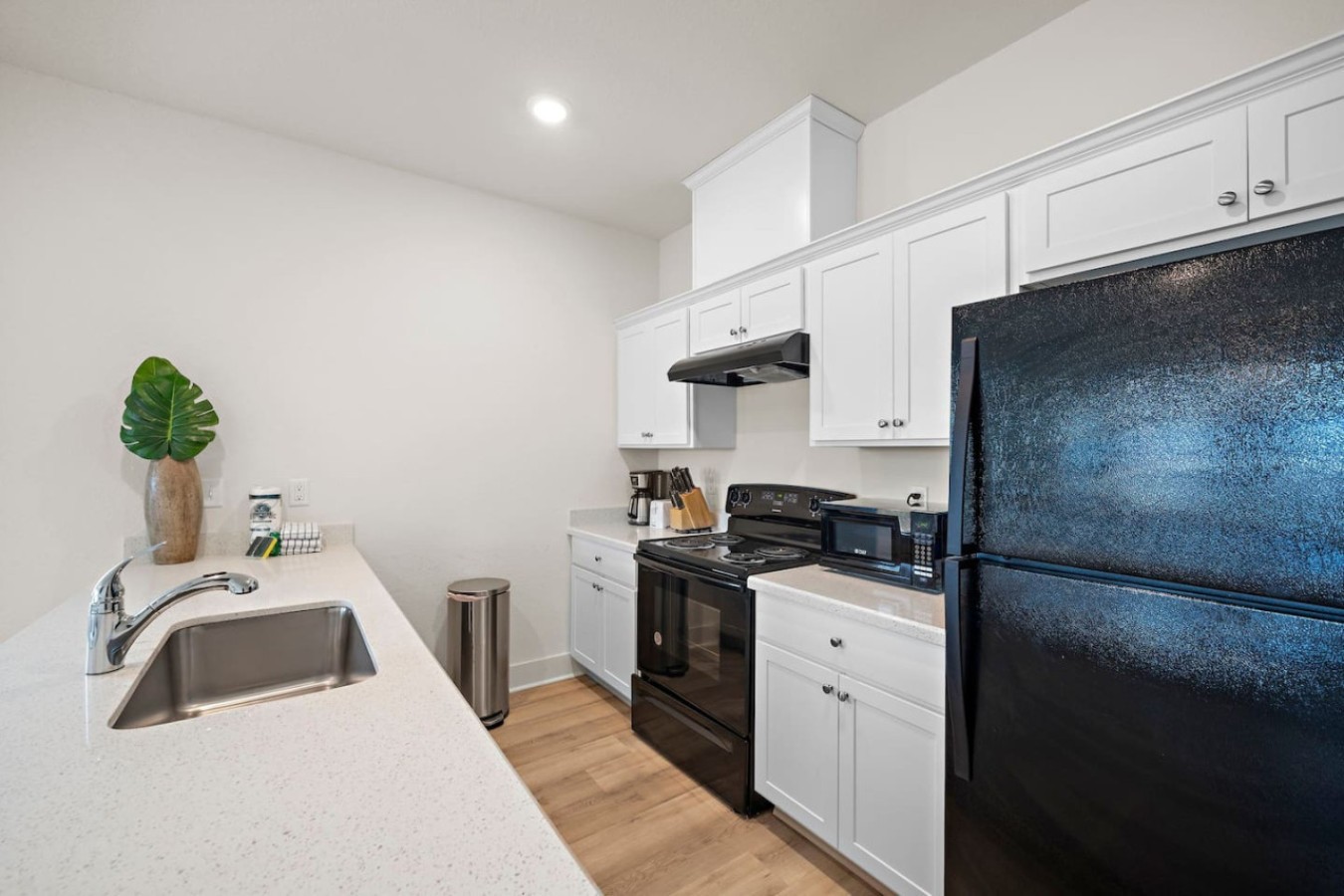 Unleash your culinary creativity in this sleek and well-designed kitchen retreat