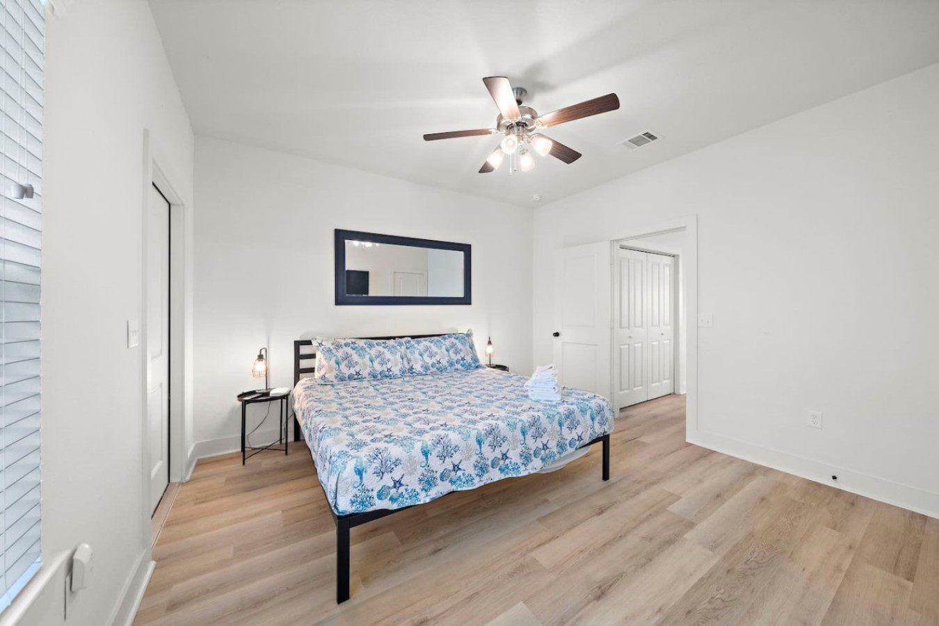 Unwind in the comfort of this stylish bedroom haven with this king-sized bed